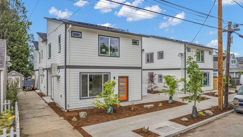 Photo 2 of 60 of Proud Ground home: Carlton Courtyard: 7 New Townhomes